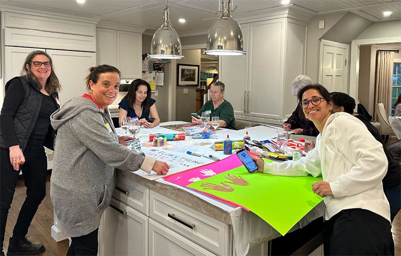 members making protest signs