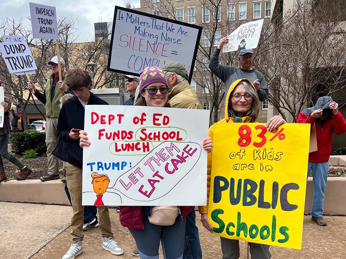 Roanoke Social Circle holding signs at a protest
